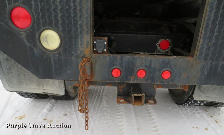 image for item DI2025 2003 Freightliner FL70 flatbed truck