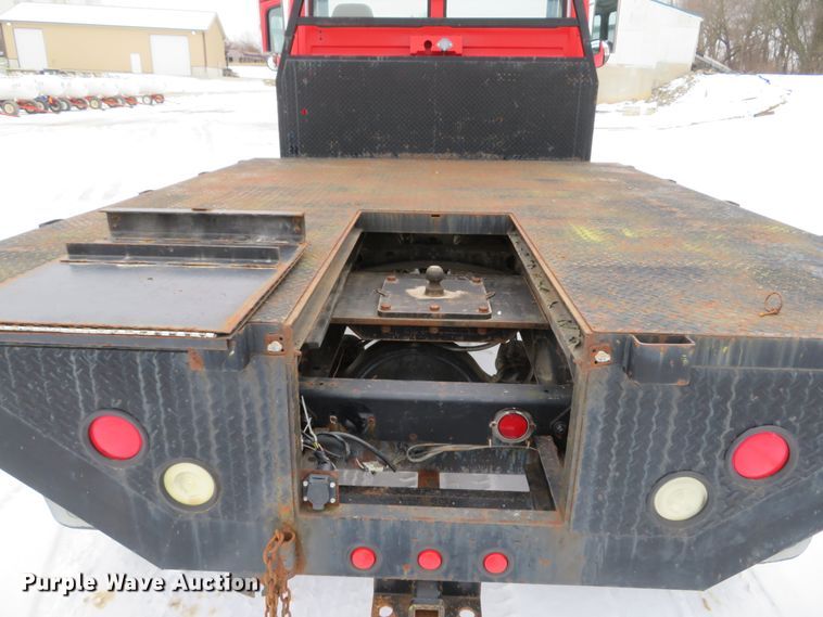 image for item DI2025 2003 Freightliner FL70 flatbed truck