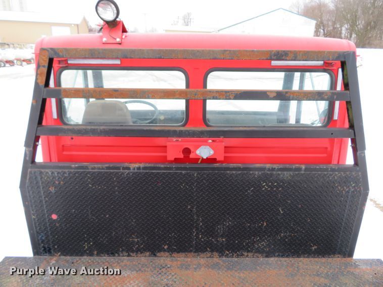 image for item DI2025 2003 Freightliner FL70 flatbed truck