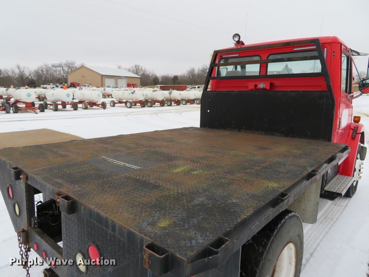 image for item DI2025 2003 Freightliner FL70 flatbed truck