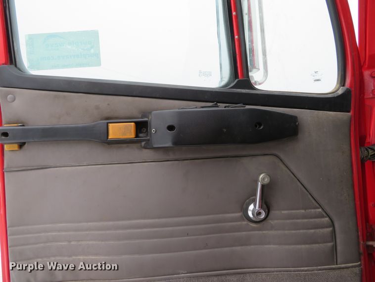 image for item DI2025 2003 Freightliner FL70 flatbed truck