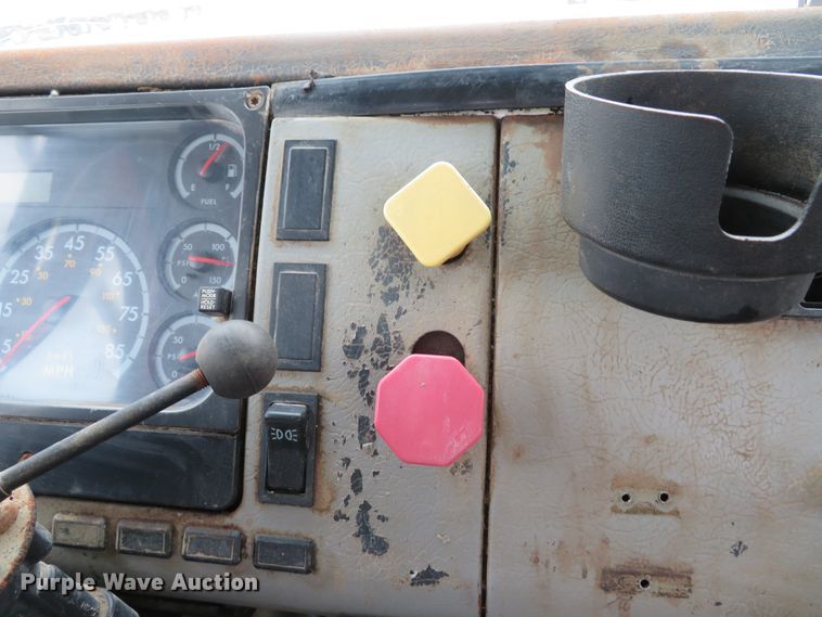 image for item DI2025 2003 Freightliner FL70 flatbed truck