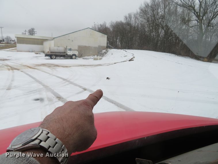 image for item DI2025 2003 Freightliner FL70 flatbed truck