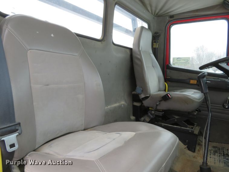 image for item DI2025 2003 Freightliner FL70 flatbed truck