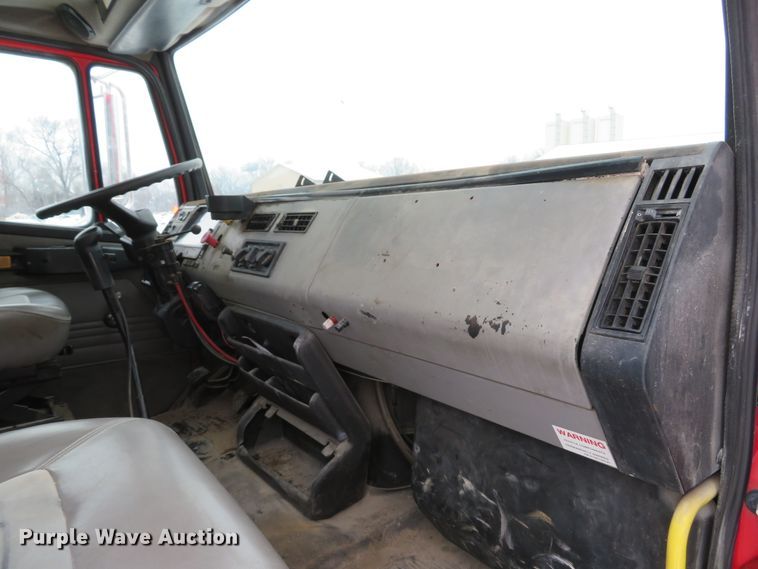 image for item DI2025 2003 Freightliner FL70 flatbed truck