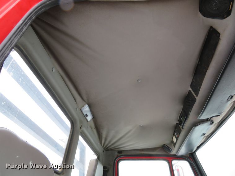 image for item DI2025 2003 Freightliner FL70 flatbed truck