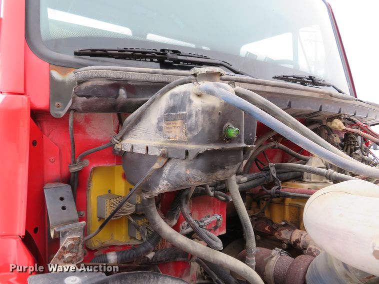 image for item DI2025 2003 Freightliner FL70 flatbed truck