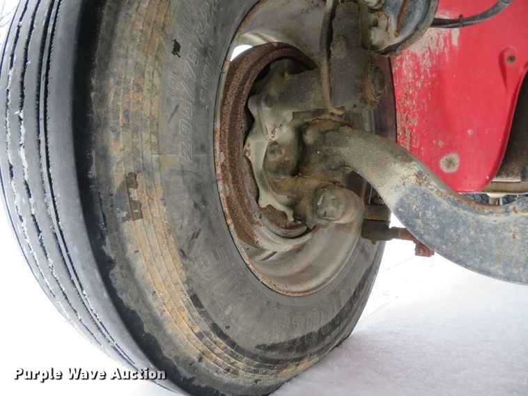 image for item DI2025 2003 Freightliner FL70 flatbed truck