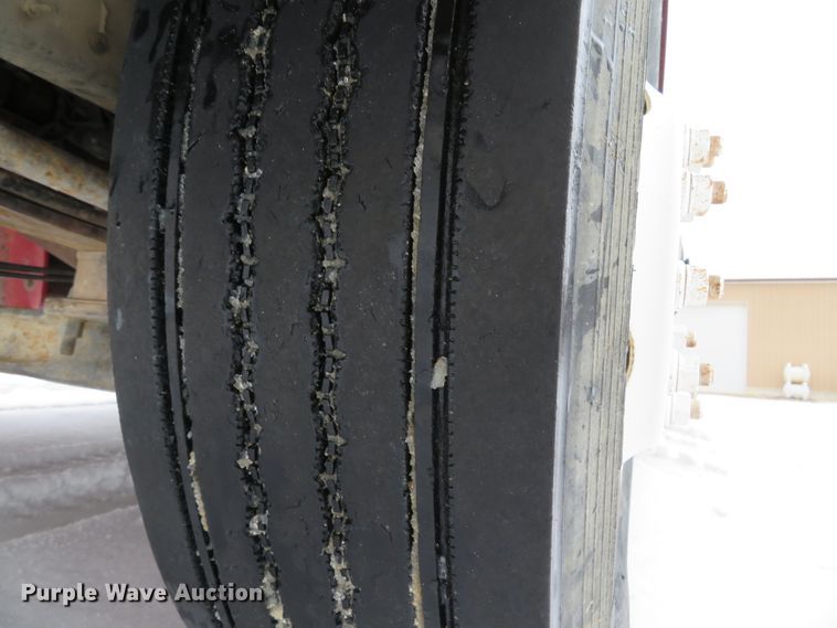 image for item DI2025 2003 Freightliner FL70 flatbed truck