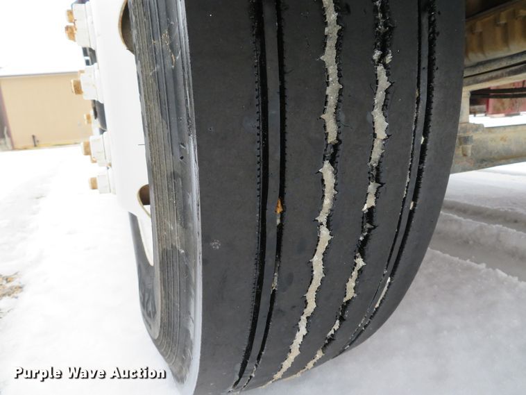 image for item DI2025 2003 Freightliner FL70 flatbed truck