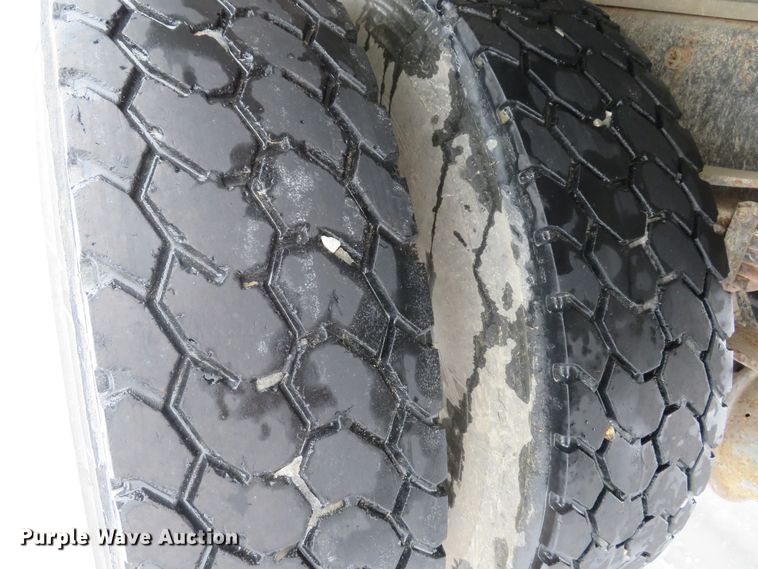 image for item DI2025 2003 Freightliner FL70 flatbed truck