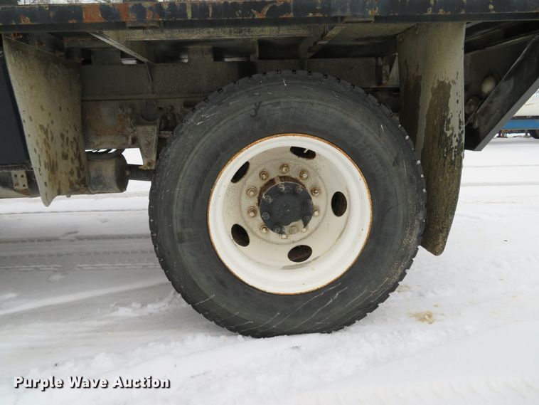 image for item DI2025 2003 Freightliner FL70 flatbed truck