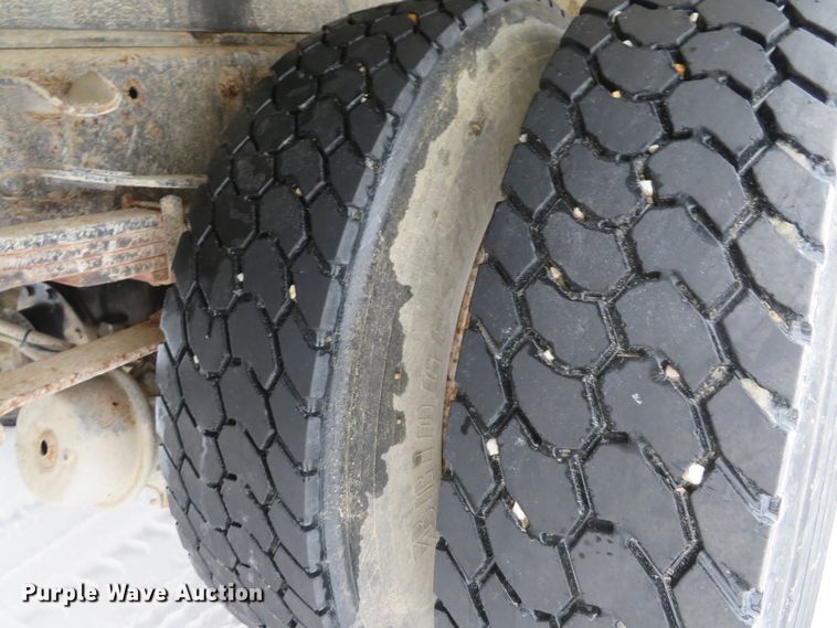 image for item DI2025 2003 Freightliner FL70 flatbed truck