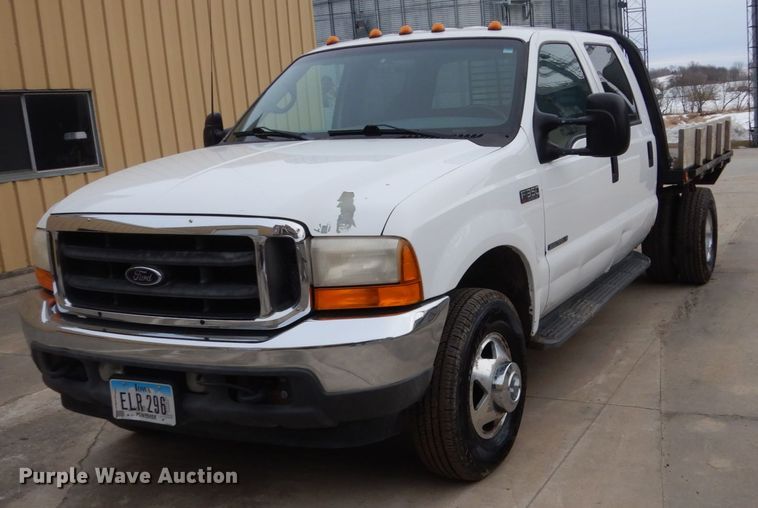 image for item FU9172 2001 Ford F350 Super Duty Crew Cab flatbed pickup truck