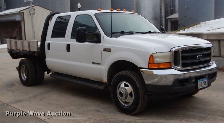 image for item FU9172 2001 Ford F350 Super Duty Crew Cab flatbed pickup truck