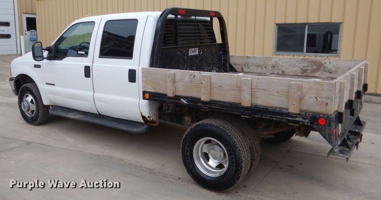 image for item FU9172 2001 Ford F350 Super Duty Crew Cab flatbed pickup truck