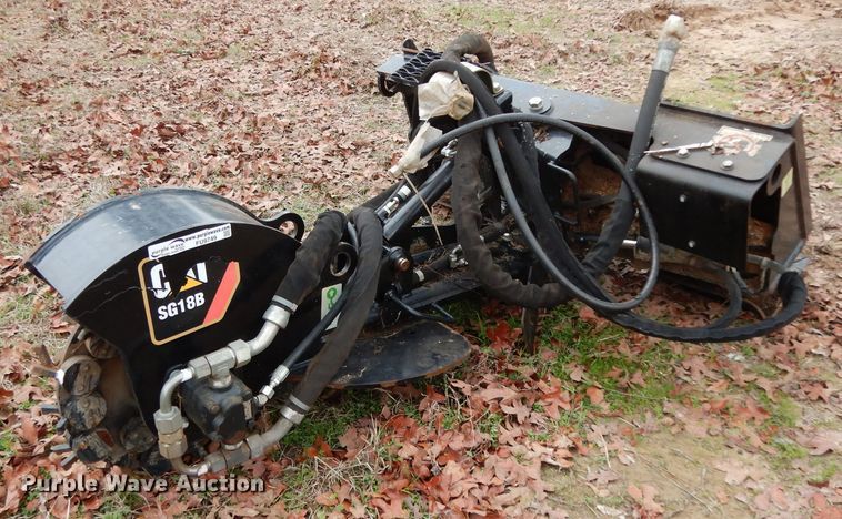 image for item FU9749 Caterpillar SG18B skid steer stump grinder