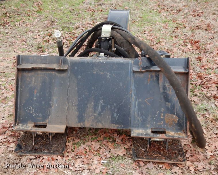 image for item FU9749 Caterpillar SG18B skid steer stump grinder