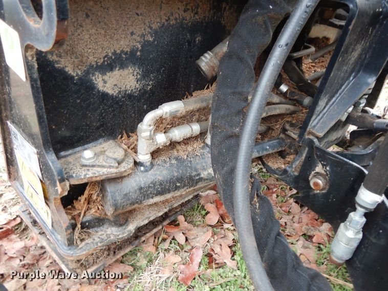 image for item FU9749 Caterpillar SG18B skid steer stump grinder