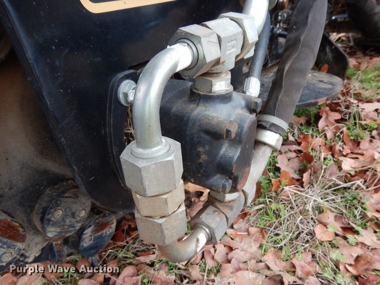 image for item FU9749 Caterpillar SG18B skid steer stump grinder