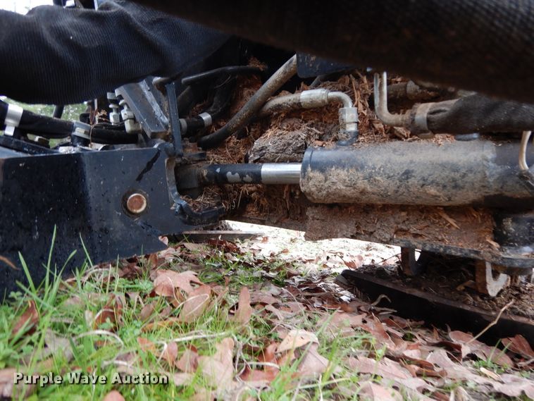 image for item FU9749 Caterpillar SG18B skid steer stump grinder