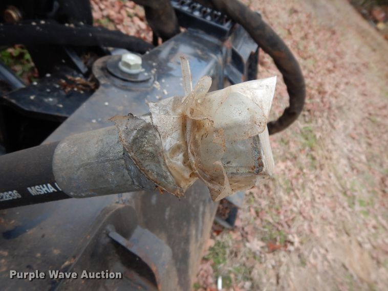 image for item FU9749 Caterpillar SG18B skid steer stump grinder