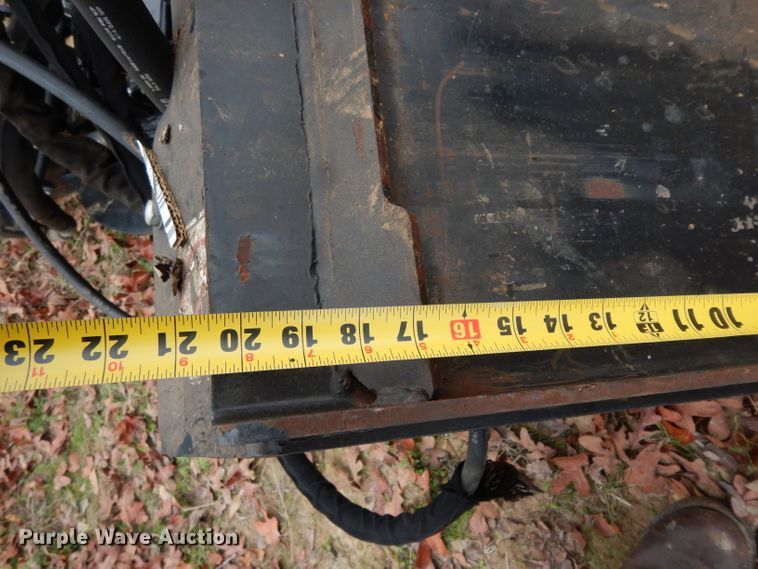 image for item FU9749 Caterpillar SG18B skid steer stump grinder