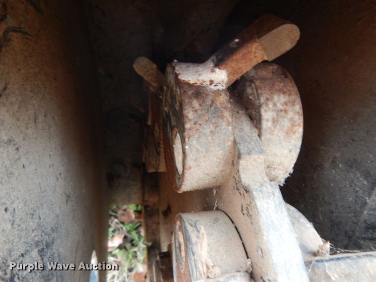 image for item FU9749 Caterpillar SG18B skid steer stump grinder