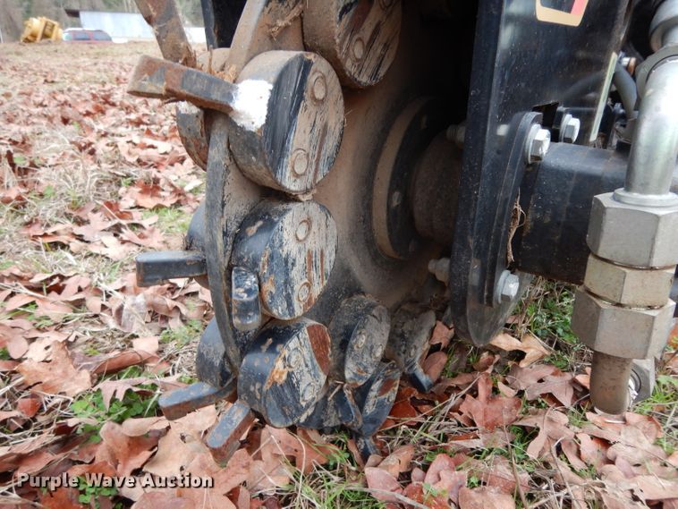 image for item FU9749 Caterpillar SG18B skid steer stump grinder