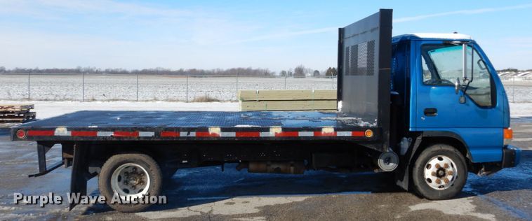 image for item GB9755 2003 Isuzu NPR dump flatbed truck