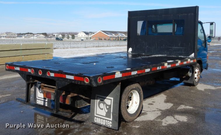 image for item GB9755 2003 Isuzu NPR dump flatbed truck