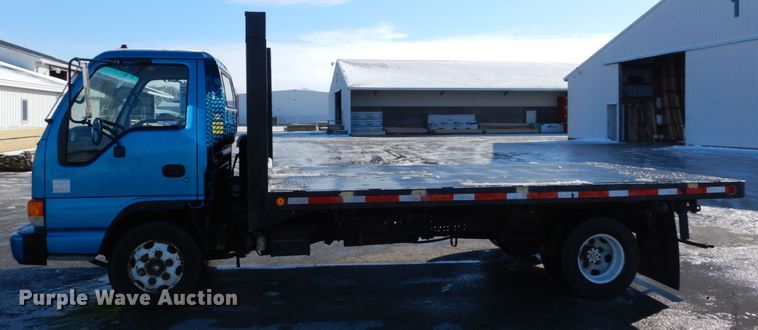 image for item GB9755 2003 Isuzu NPR dump flatbed truck