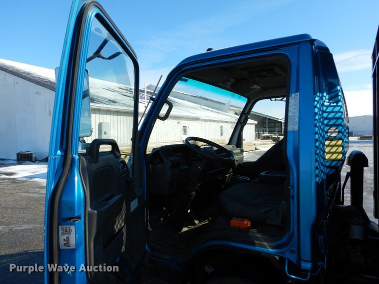 image for item GB9755 2003 Isuzu NPR dump flatbed truck