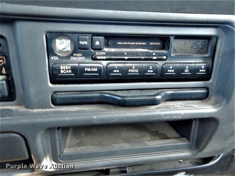 image for item GB9755 2003 Isuzu NPR dump flatbed truck