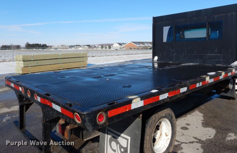 image for item GB9755 2003 Isuzu NPR dump flatbed truck