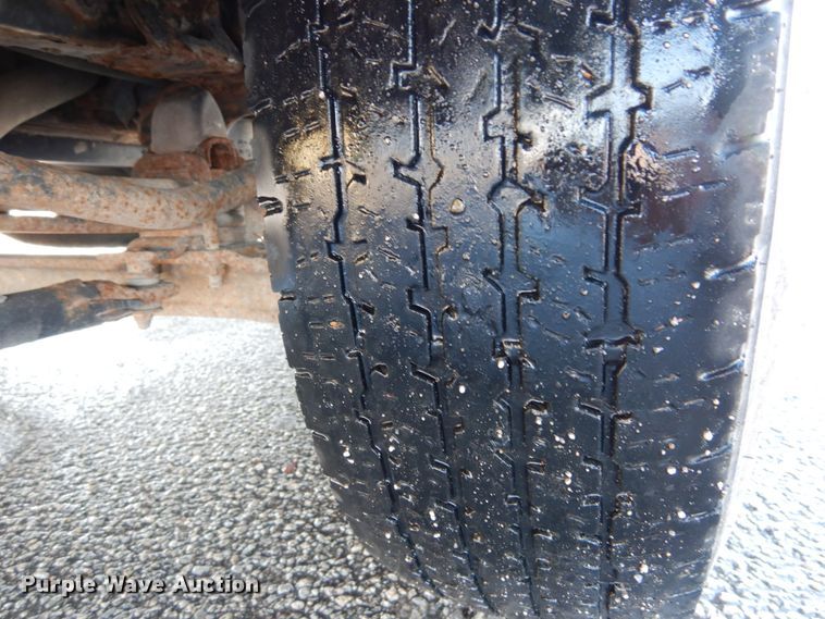 image for item GB9755 2003 Isuzu NPR dump flatbed truck