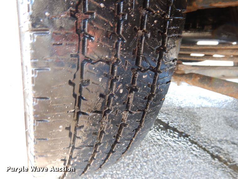 image for item GB9755 2003 Isuzu NPR dump flatbed truck