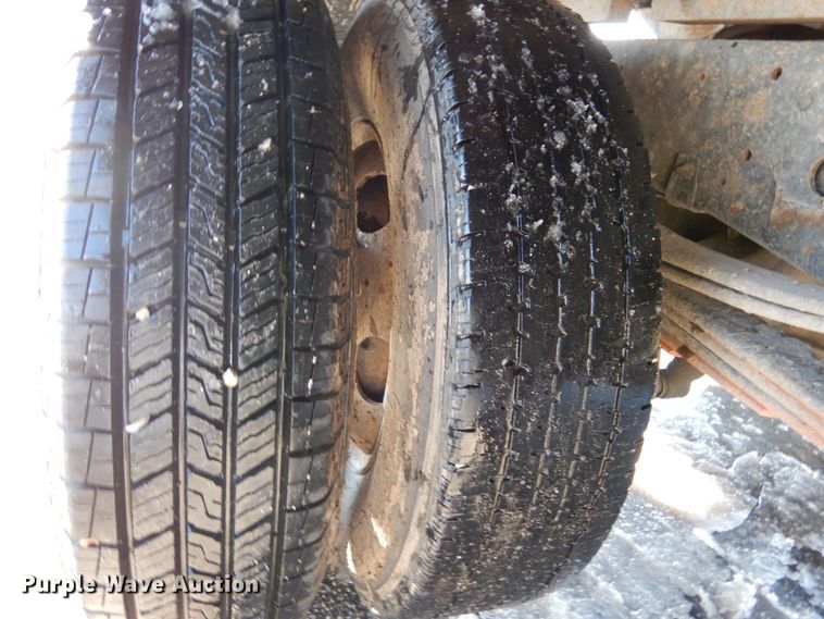 image for item GB9755 2003 Isuzu NPR dump flatbed truck