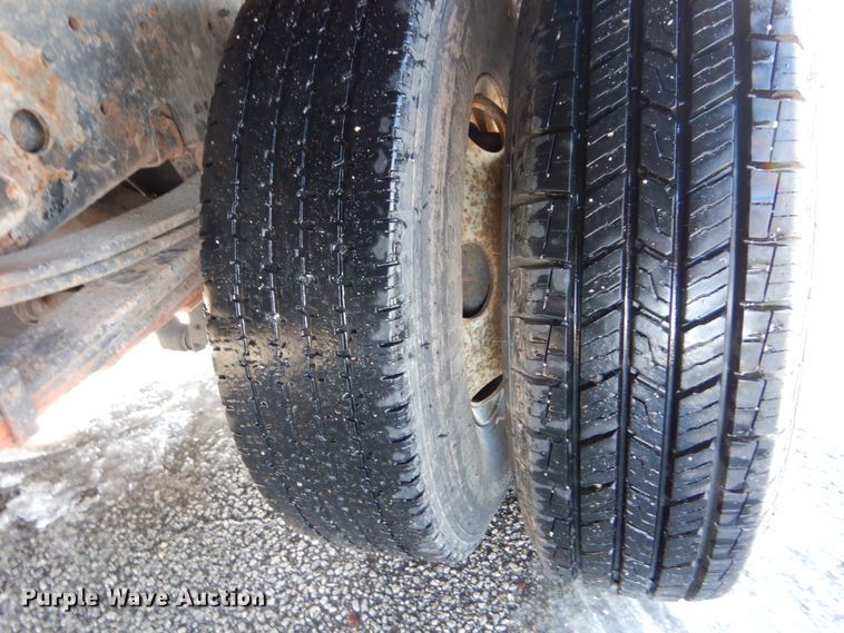 image for item GB9755 2003 Isuzu NPR dump flatbed truck