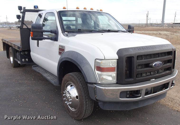image for item GC9170 2010 Ford F550 SuperCab flatbed truck