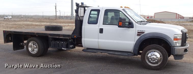 image for item GC9170 2010 Ford F550 SuperCab flatbed truck