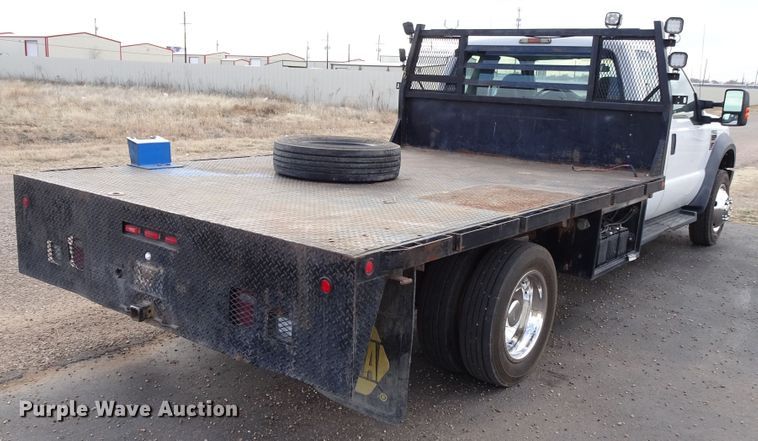 image for item GC9170 2010 Ford F550 SuperCab flatbed truck