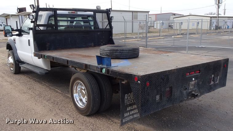 image for item GC9170 2010 Ford F550 SuperCab flatbed truck