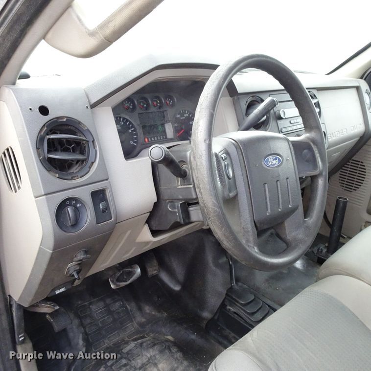 image for item GC9170 2010 Ford F550 SuperCab flatbed truck