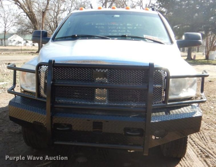 image for item GD9013 2007 Dodge Ram 2500 Quad Cab flatbed pickup truck