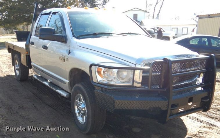image for item GD9013 2007 Dodge Ram 2500 Quad Cab flatbed pickup truck
