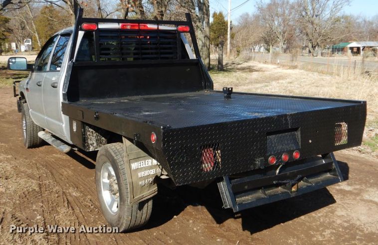 image for item GD9013 2007 Dodge Ram 2500 Quad Cab flatbed pickup truck