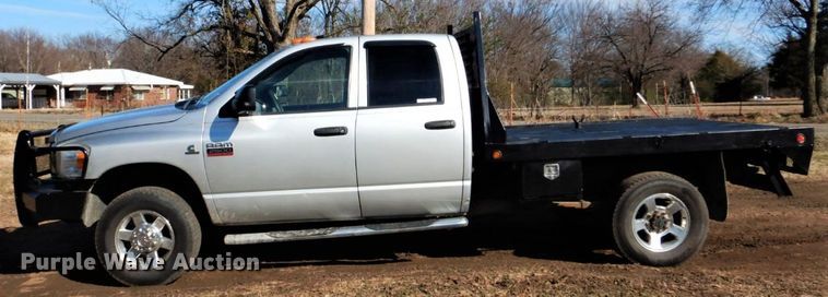 image for item GD9013 2007 Dodge Ram 2500 Quad Cab flatbed pickup truck