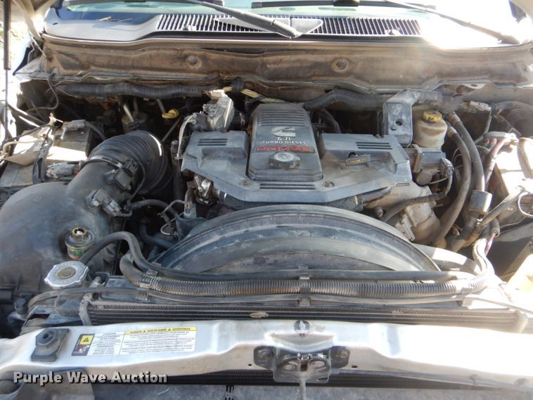 image for item GD9013 2007 Dodge Ram 2500 Quad Cab flatbed pickup truck