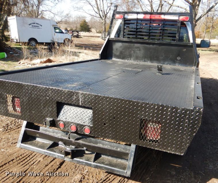 image for item GD9013 2007 Dodge Ram 2500 Quad Cab flatbed pickup truck